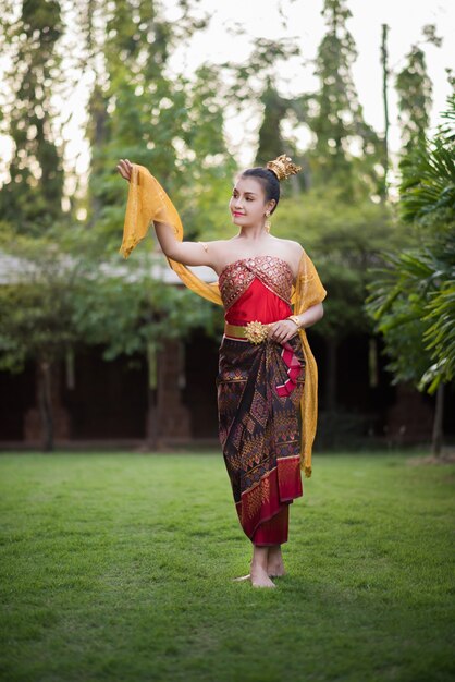 Beautiful Woman wearing typical Thai dress