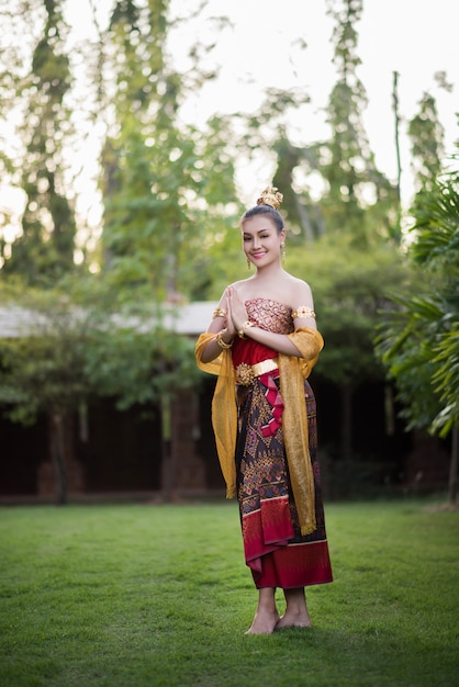 Beautiful Woman wearing typical Thai dress