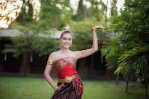 Free photo beautiful woman wearing typical thai dress