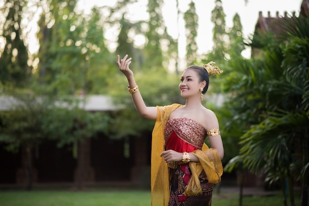 Beautiful Woman wearing typical Thai dress