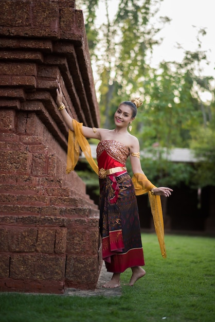 Free photo beautiful woman wearing typical thai dress