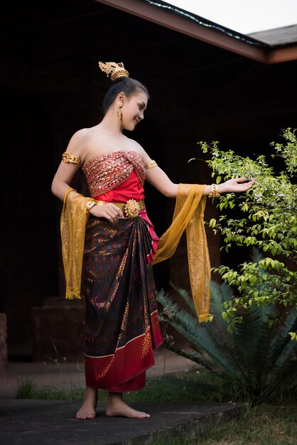 Beautiful Woman wearing typical Thai dress