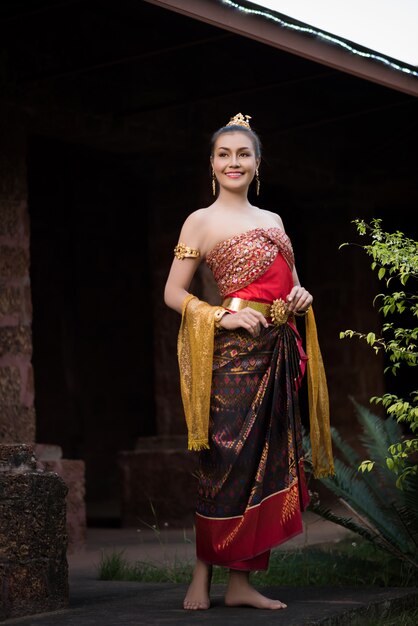 Beautiful Woman wearing typical Thai dress