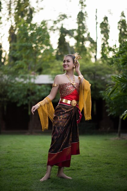 Beautiful Woman wearing typical Thai dress