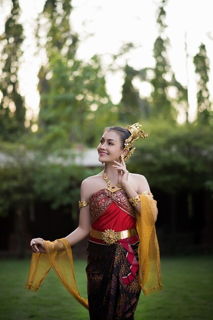 Beautiful Woman wearing typical Thai dress