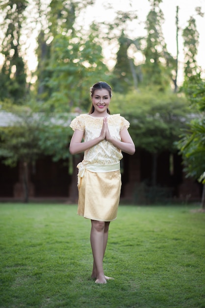 Beautiful Woman wearing typical Thai dress