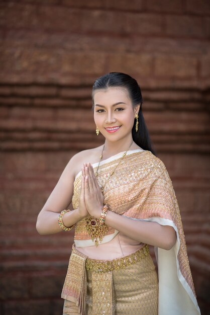 Beautiful Woman wearing typical Thai dress