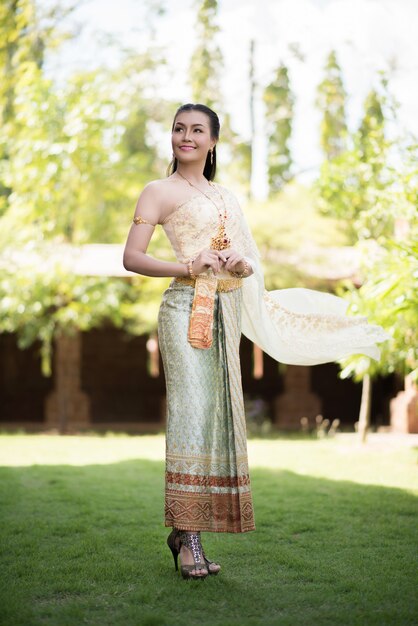 Beautiful Woman wearing typical Thai dress