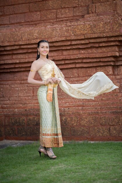 Beautiful Woman wearing typical Thai dress