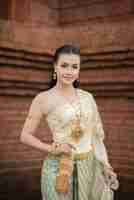 Free photo beautiful woman wearing typical thai dress