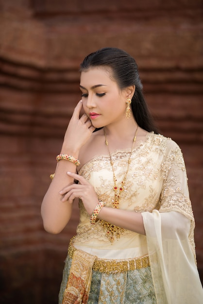 Beautiful Woman wearing typical Thai dress