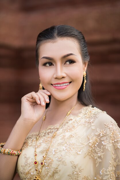 Beautiful Woman wearing typical Thai dress