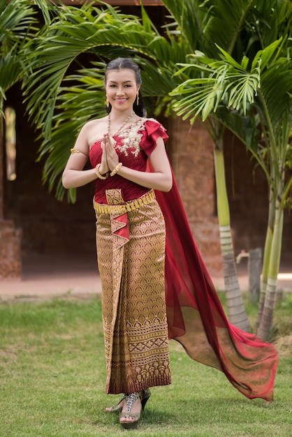 Beautiful Woman wearing typical Thai dress