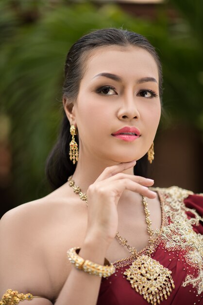 Beautiful Woman wearing typical Thai dress