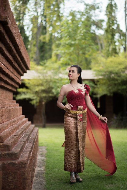 Beautiful Woman wearing typical Thai dress