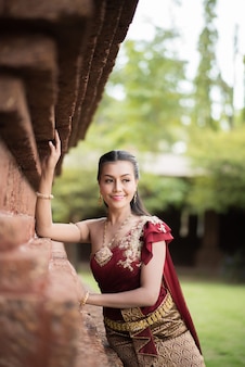 https://img.freepik.com/free-photo/beautiful-woman-wearing-typical-thai-dress_1150-5456.jpg?size=338&ext=jpg