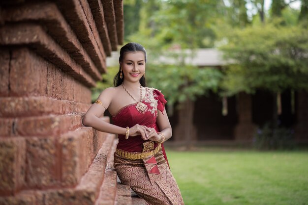 Beautiful Woman wearing typical Thai dress