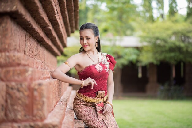 Beautiful Woman wearing typical Thai dress