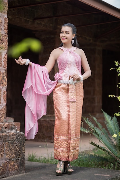 Free photo beautiful woman wearing typical thai dress