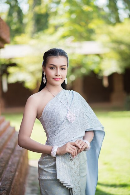 Beautiful Woman wearing typical Thai dress