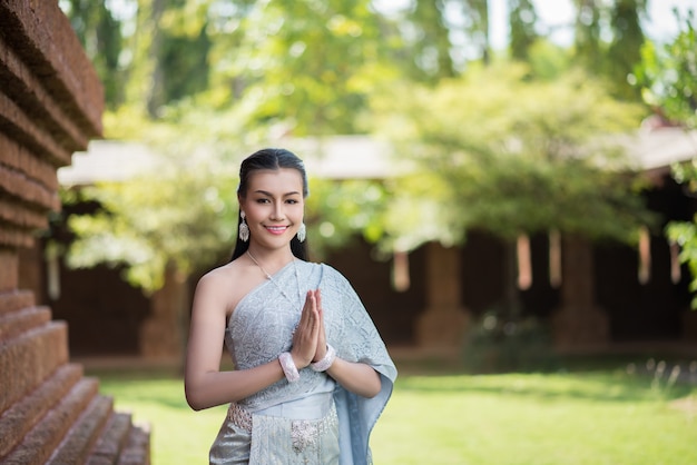 Free photo beautiful woman wearing typical thai dress