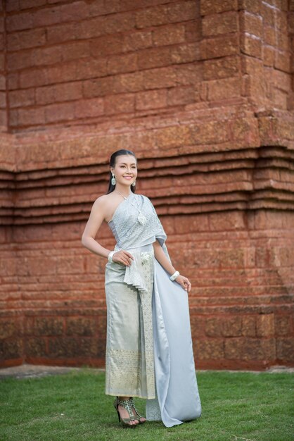 Beautiful Woman wearing typical Thai dress