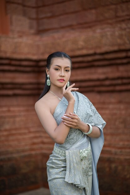 Beautiful Woman wearing typical Thai dress