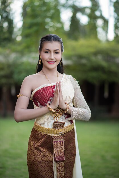 Beautiful Woman wearing typical Thai dress