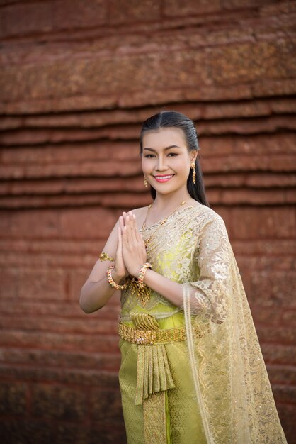 Beautiful Woman wearing typical Thai dress