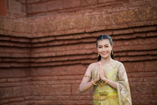 Free photo beautiful woman wearing typical thai dress