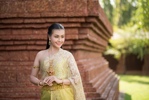 Beautiful Woman wearing typical Thai dress