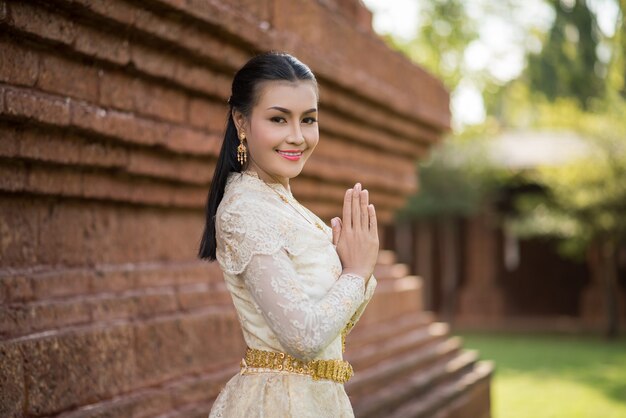 Beautiful Woman wearing typical Thai dress