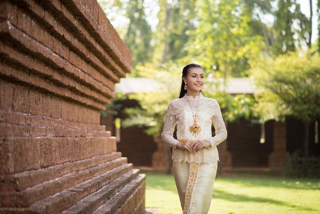 Beautiful Woman wearing typical Thai dress