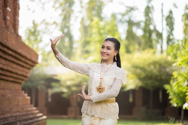 Free photo beautiful woman wearing typical thai dress