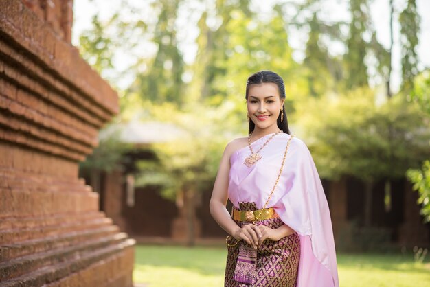 Beautiful Woman wearing typical Thai dress