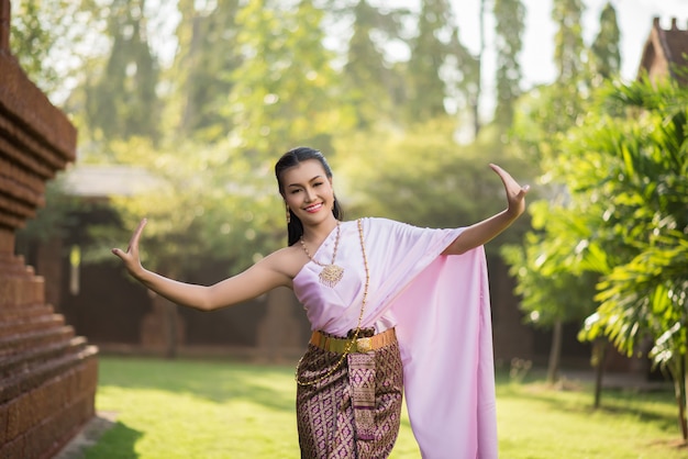 Beautiful Woman wearing typical Thai dress