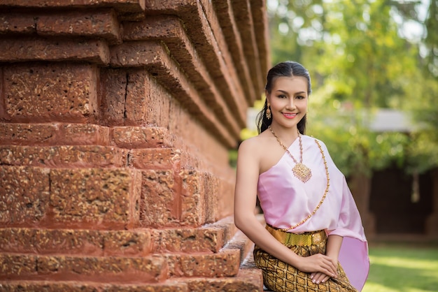 Free photo beautiful woman wearing typical thai dress