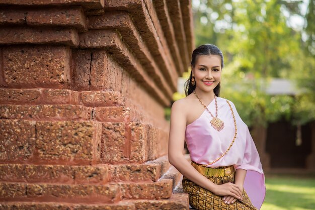 Beautiful Woman wearing typical Thai dress