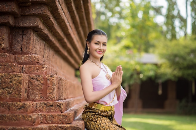 Beautiful Woman wearing typical Thai dress