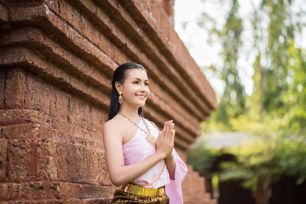 Beautiful Woman wearing typical Thai dress