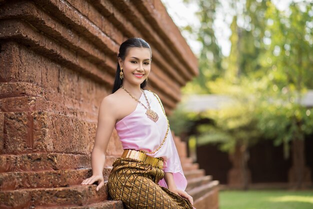 Beautiful Woman wearing typical Thai dress