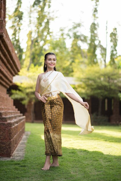 Beautiful Woman wearing typical Thai dress