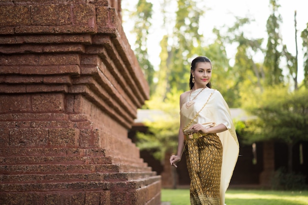 Beautiful Woman wearing typical Thai dress