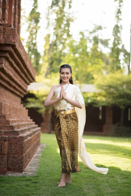 Beautiful Woman wearing typical Thai dress