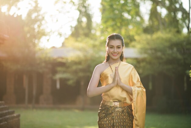 Beautiful Woman wearing typical Thai dress