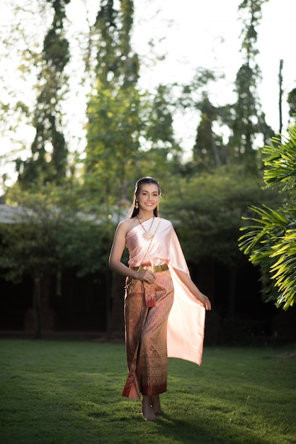 Beautiful Woman wearing typical Thai dress