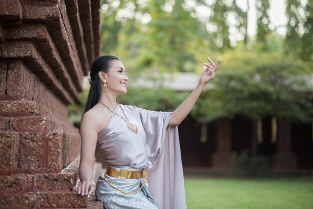 Beautiful Woman wearing typical Thai dress