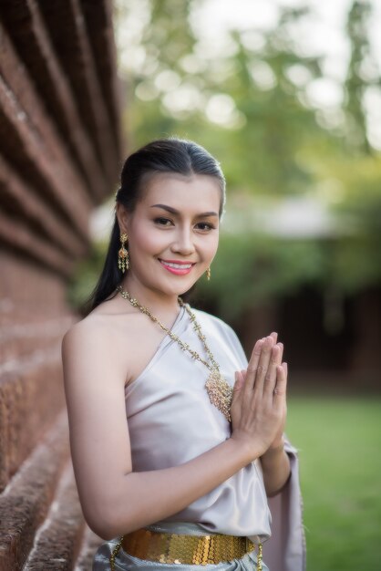 Beautiful Woman wearing typical Thai dress