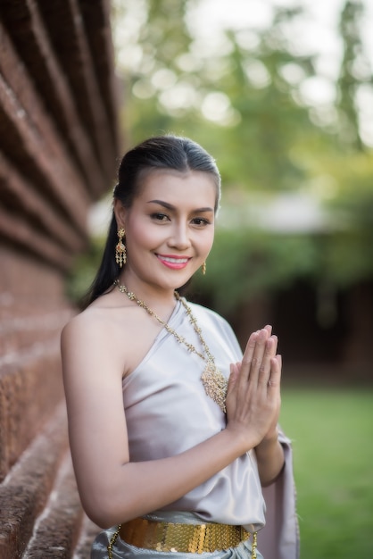 Beautiful Woman wearing typical Thai dress