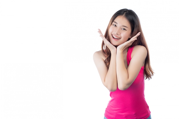 Beautiful woman wears a pink shirt with a smile showing her hand